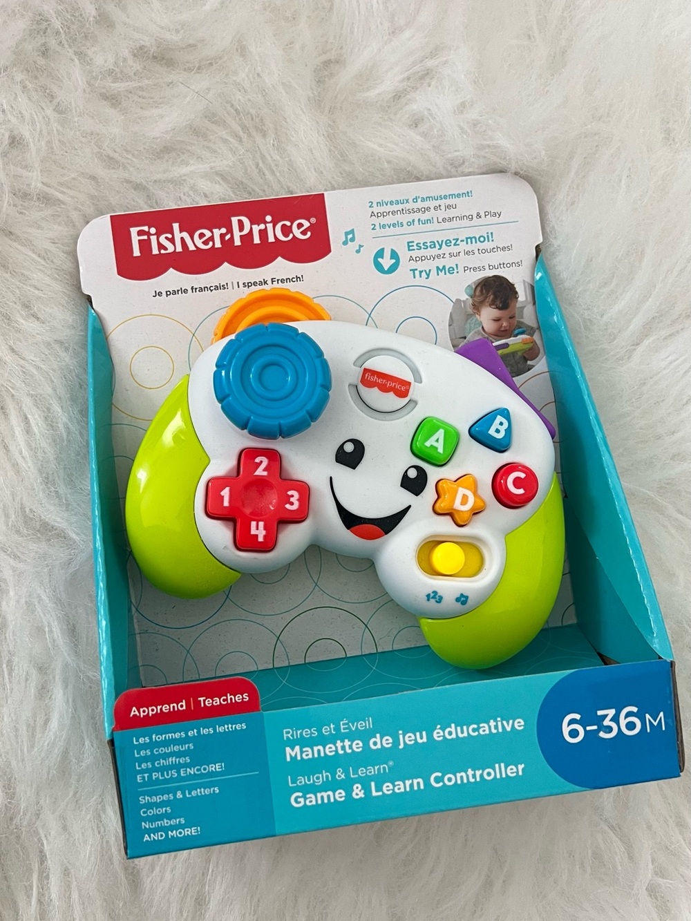 Fisher-Price White Play Controller with Green Handles and Colorful Buttons